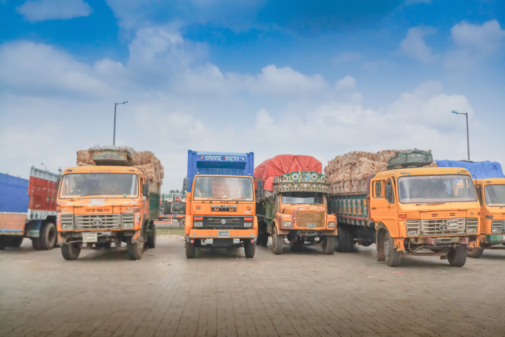 Successful Nigerian distribution business with delivery trucks ready for dispatch